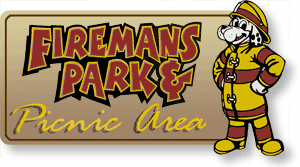 Fireman's Park &amp; Picnic Area sign with dog dressed as a firefigher